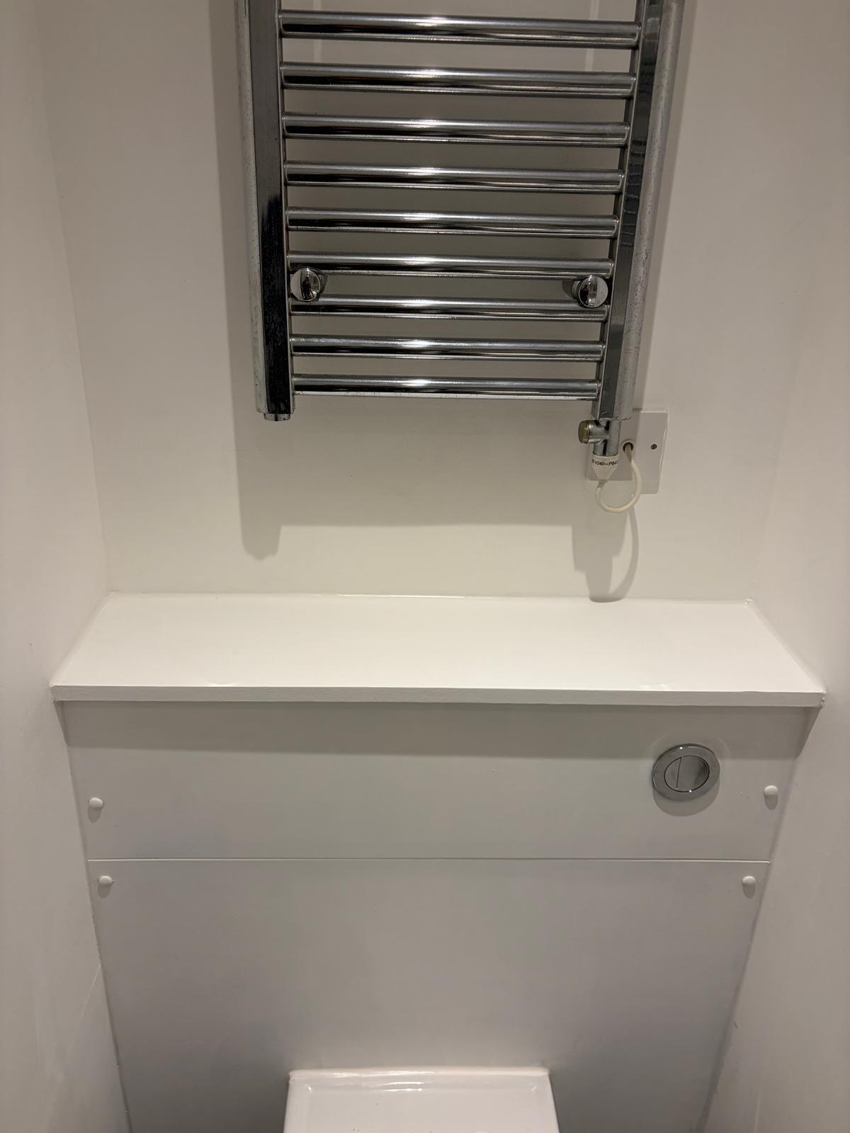 Toilet pipe wooden boxing carpentry build in SW11 London