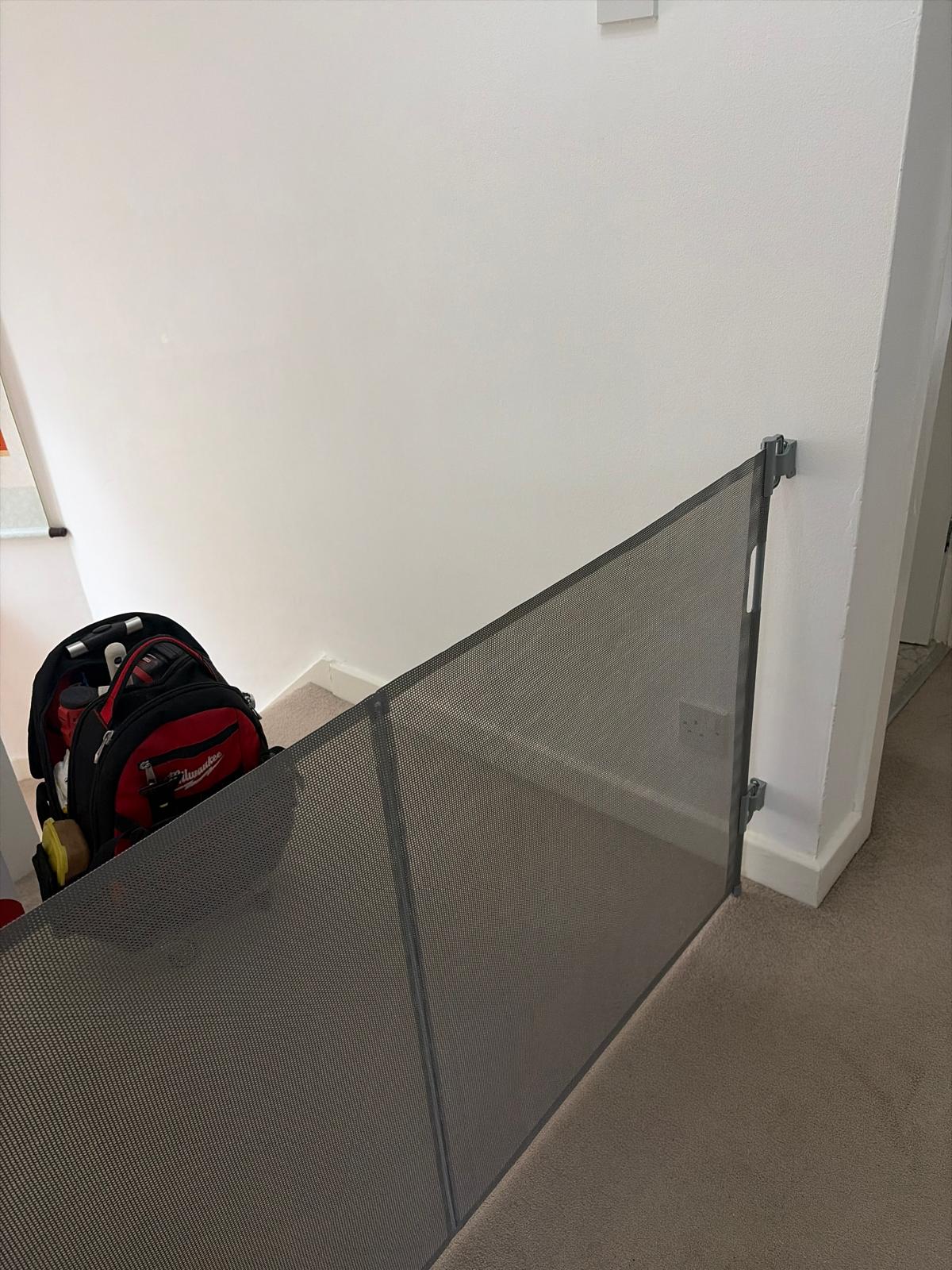 baby safety gate installation on stairs in NW9 London